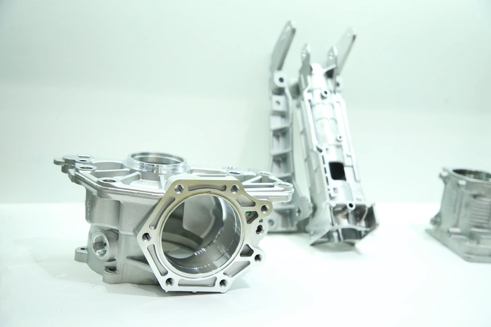 Machined aluminum prototype parts on a table